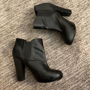 High heel black booties.